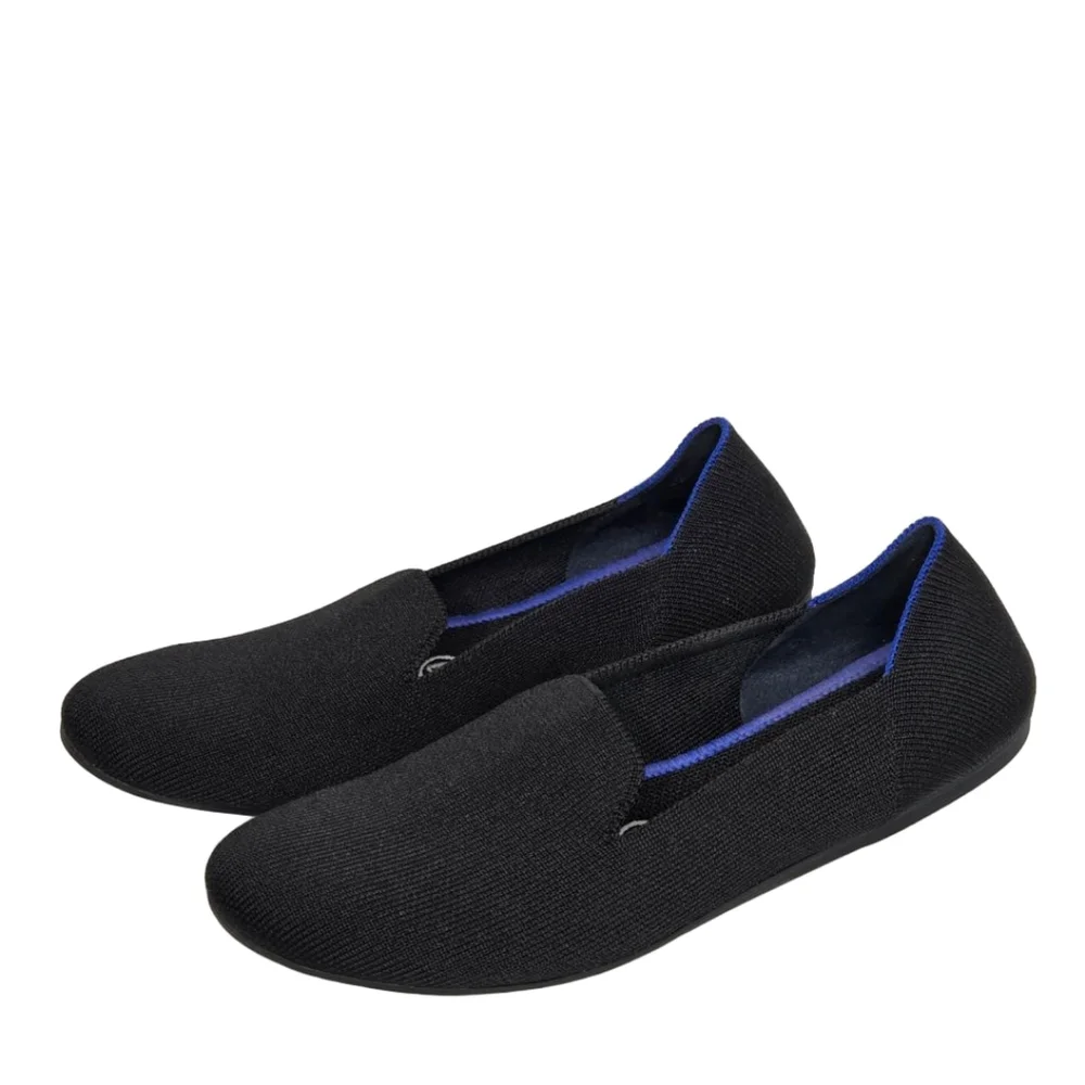 Rothy's Black Slip-On Flats with Blue Trim